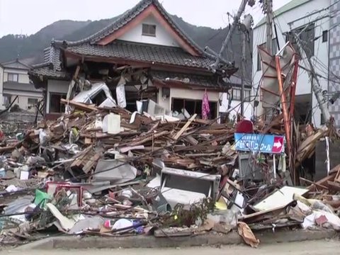 Search and rescue teams hunt for survivors following the devastating earthquake and tsunami in Japan in 2011. 