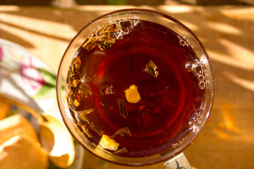 strong black tea in a transparent mug