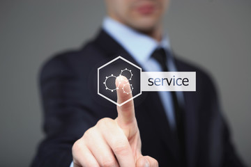 technology and internet concept - businessman pressing service button on virtual screens