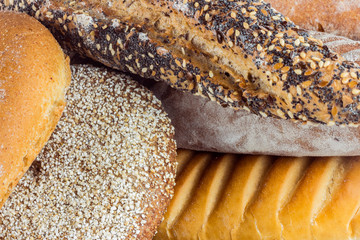 Composition with bread and rolls isolated on white