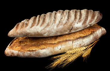 Composition with bread and rolls isolated on white