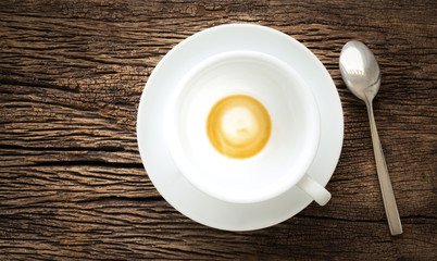 Empty coffee cup on a wooden table
