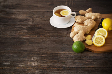 cup of ginger tea on a wooden table