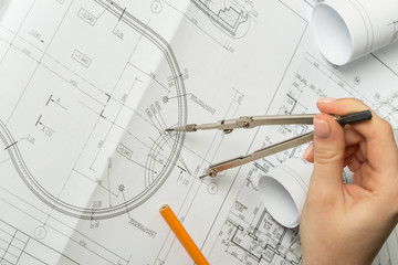 Architect working on blueprint