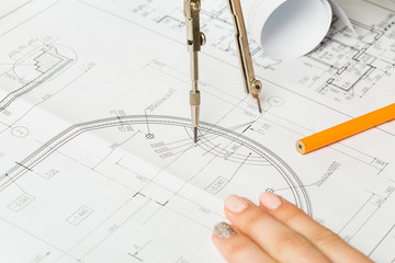 Architect working on blueprint