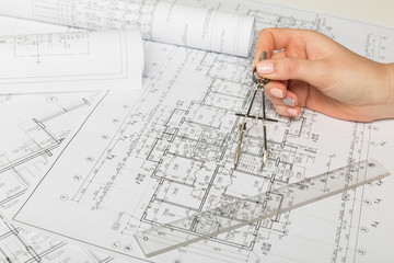 Architect working on blueprint