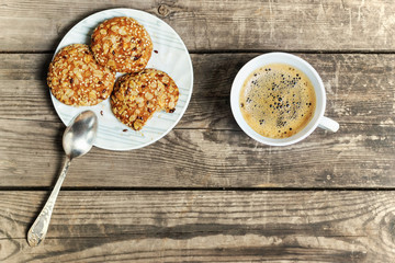 Morning coffee with oatmeal cookies . With copy space