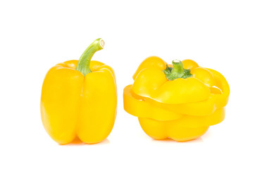 Yellow bell peppers cut pieces on white background.