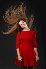 Fototapeta premium The concept of hair care products. Healthy long shiny hair