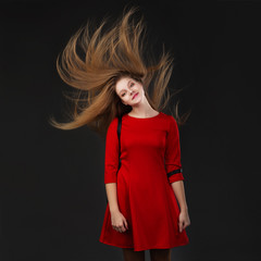Fototapeta premium The concept of hair care products. Healthy long shiny hair