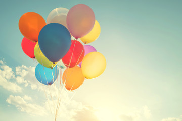 multicolor balloons with a retro instagram filter effect, concept of happy birthday in summer and wedding honeymoon party (Vintage color tone) - 104469510