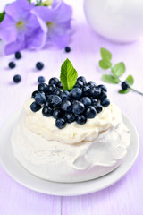 Meringue cake Pavlova with blueberries