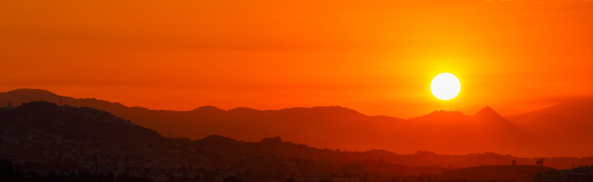 Fototapeta Amazing Sunset Sunrise Over Dark Mountain Silhouette