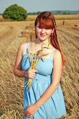  Girl enjoying nature on the field. Happy farmer enjoying great harvest, agricultural industry.