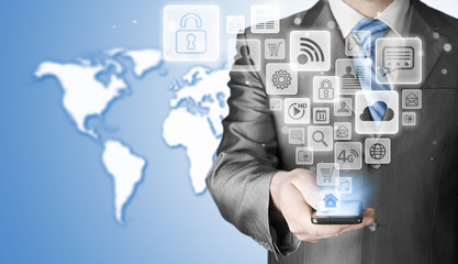 Business man using smart phone with social media icon set