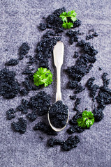 Black caviar in the spoon