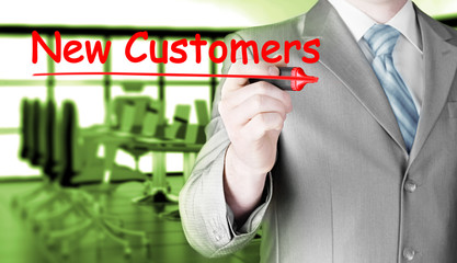 businessman writing new customers