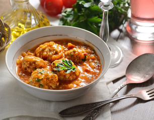 meatballs in tomato sauce, tomatoes, herbs,  oil