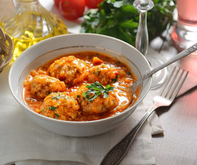 meatballs in tomato sauce, tomatoes, herbs,  oil