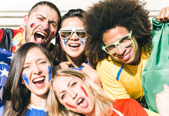 Group of fans supporting their teams at the arena