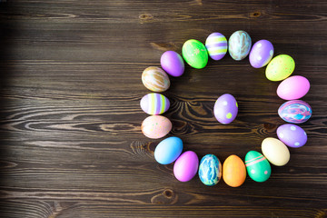 Obraz premium Easter eggs on wooden background