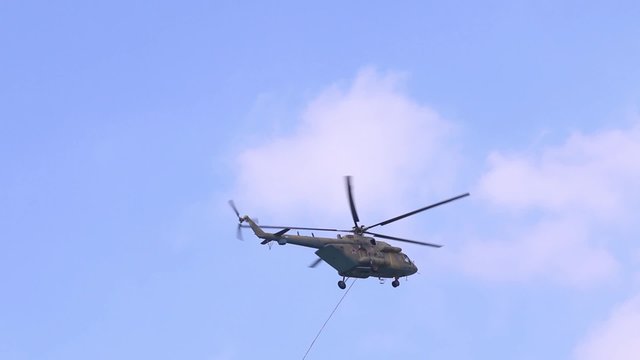 PERM, RUSSIA - JUN 27, 2015: Flying helicopter mi-26 on airshow Wings of Parma