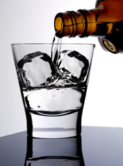 POURING GLASS OF COINTREAU