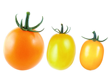 Red and yellow tomatoes, isolate on a white background close-up
