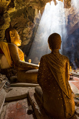 Amazing Buddhism with the ray of light in the cave