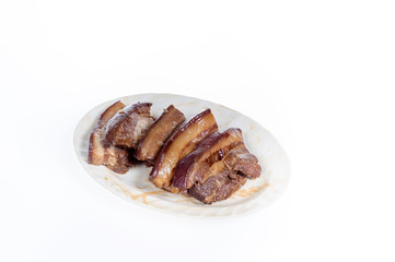 soy-stewed pork(chinese food) on a plate isolated on white background