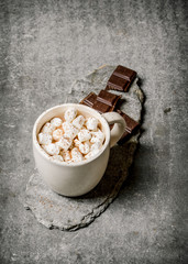 Hot chocolate with marshmallows and bitter chocolate.
