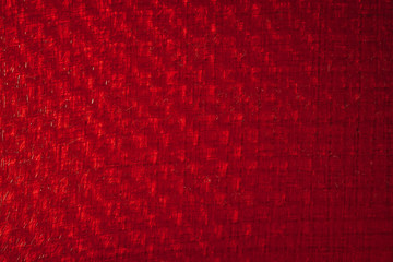 red carbon fiber texture, closeup view