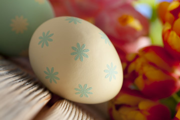 Easter eggs and colorful flowers