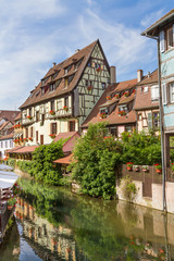 Fototapeta na wymiar Colmar, Petit Venice, water canal and timbered houses. Alsace, France.