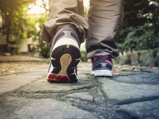 Man Walking on trail Outdoor Jogging exercise Healthy lifestyle