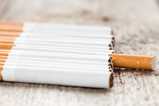 Row of cigarettes with selective focus
