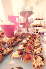 Obraz na płótnie Canvas assorted sweets on the table