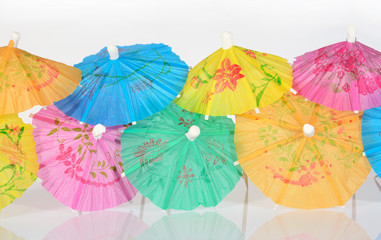 Fototapeta na wymiar Colorful paper cocktail umbrella