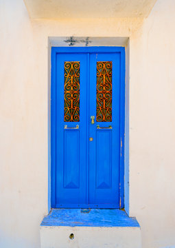 the beautiful door of an old house at Chora, the capital of Andros island in Greece
