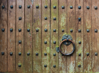 old church door and door knocker  grunge background