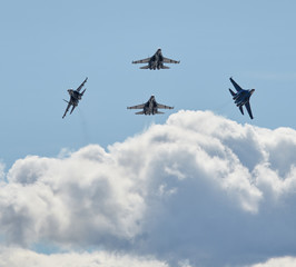 Russia, Saint-Petersburg, 25 april 2015: Performance of " Russian Knights " at the air show in the exhibition complex "Lenexpo" , the skill demonstrated aerobatic team, su-21, su-24