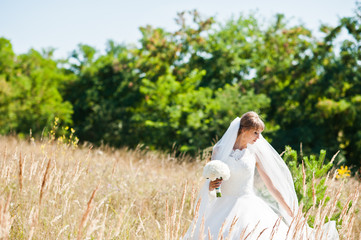 Cute bride  at high and dry ears