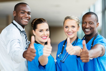 Fototapeta na wymiar group of healthcare workers thumbs up