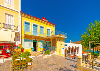 Fototapeta na wymiar buildings and shops located around the main square of Chora, the capital of Andros island in Greece