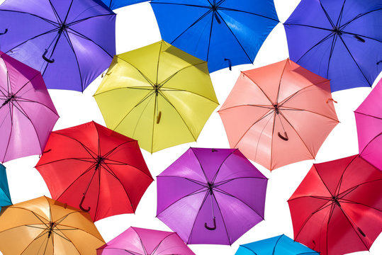 colored umbrellas isolated on white background