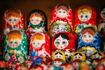Fototapeta na wymiar Colorful Russian Nesting Dolls Matreshka At Market. 