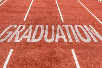 Graduation written on running track