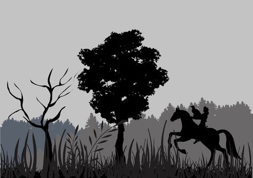 Silhouette of Kazakh rider hunting with eagle