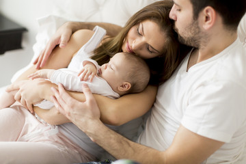 Happy family with newborn baby