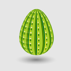 Picture spring egg with green striped pattern on the shell
Spring egg with green striped pattern on the shell on a gray background with shadow
